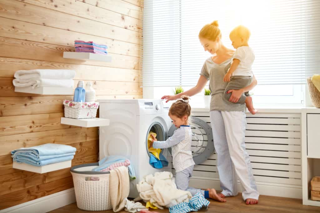 Do you want to know how to get kids to do chores. First of all, think of chores as a learning process. This mom is teaching her daughter how to do the laundry.