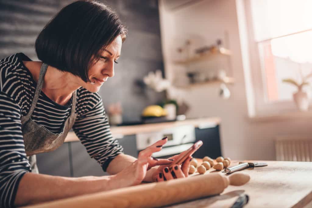 Keep your kitchen clean while you cook by looking at your recipe and planning ahead before you begin cooking.